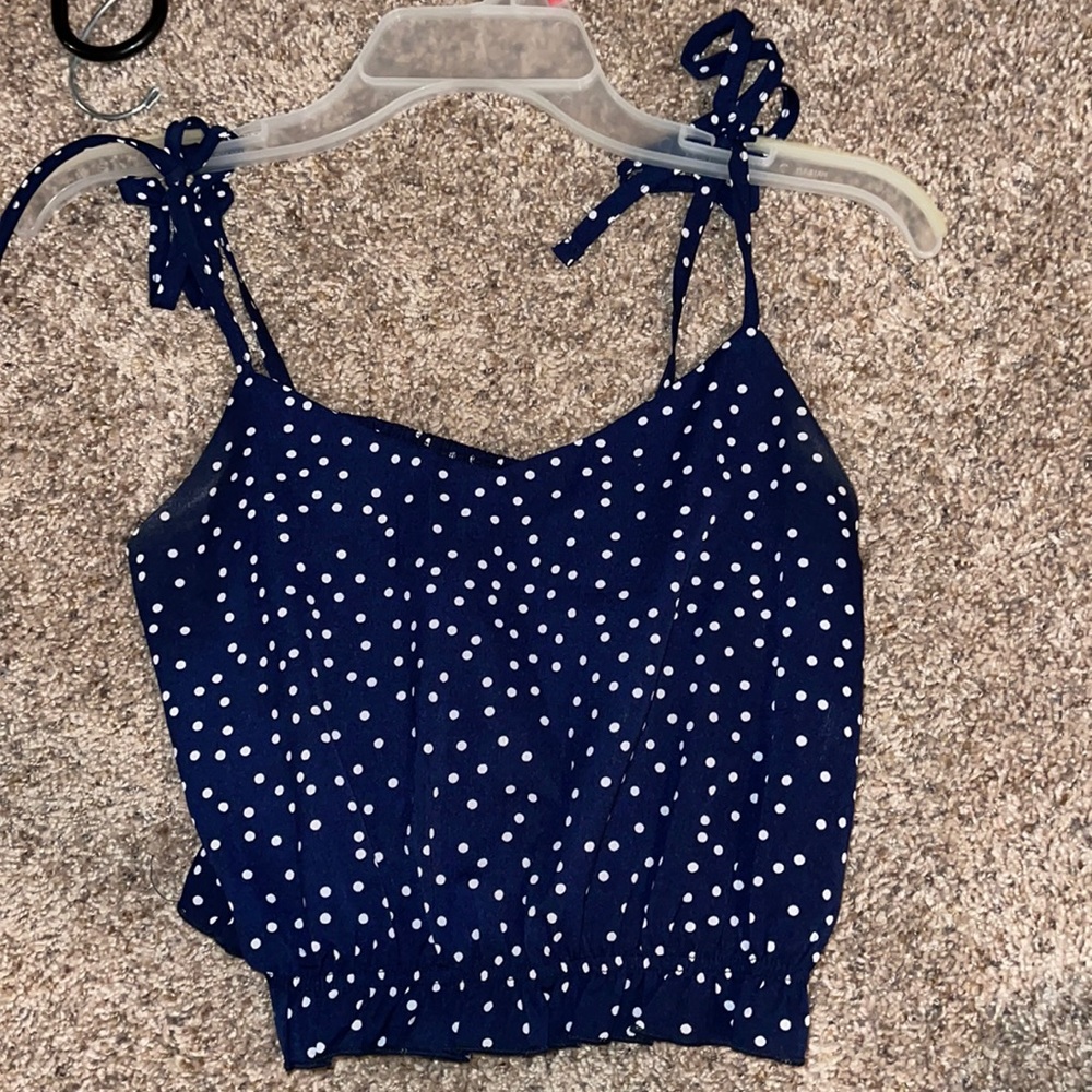 Navy blue polka dotted tank top
